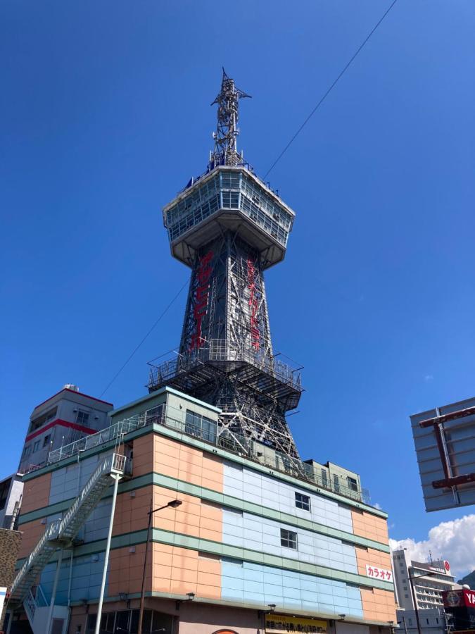 J-Hoppers Beppu Guesthouse ジェイホッパーズ別府ゲストハウス Exteriör bild